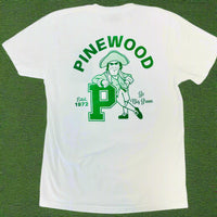 White t-shirt with green 'Pinewood' logo featuring a character and text on a white background